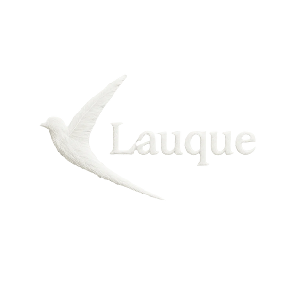 White ceramic dove with 'Lauque' branding on a light gray background